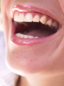 Woman Laughing in Laughter Yoga